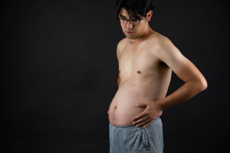 Man with bloated stomach
