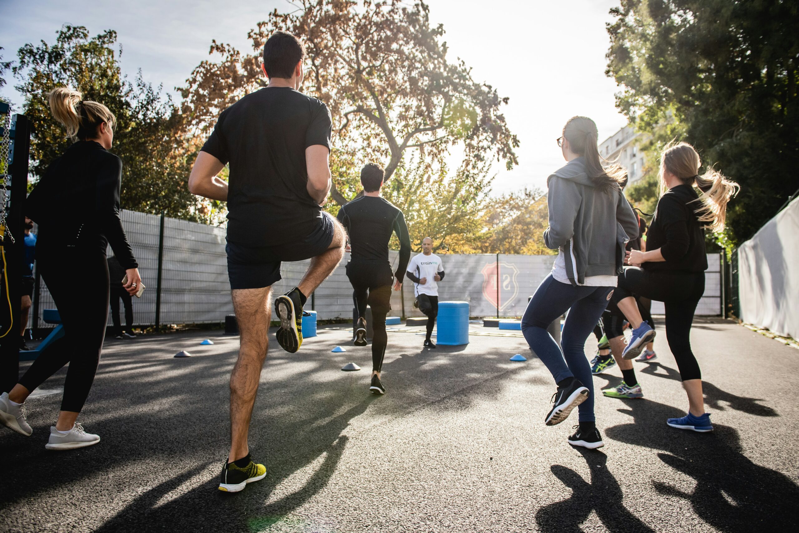 People doing exercise in a circle