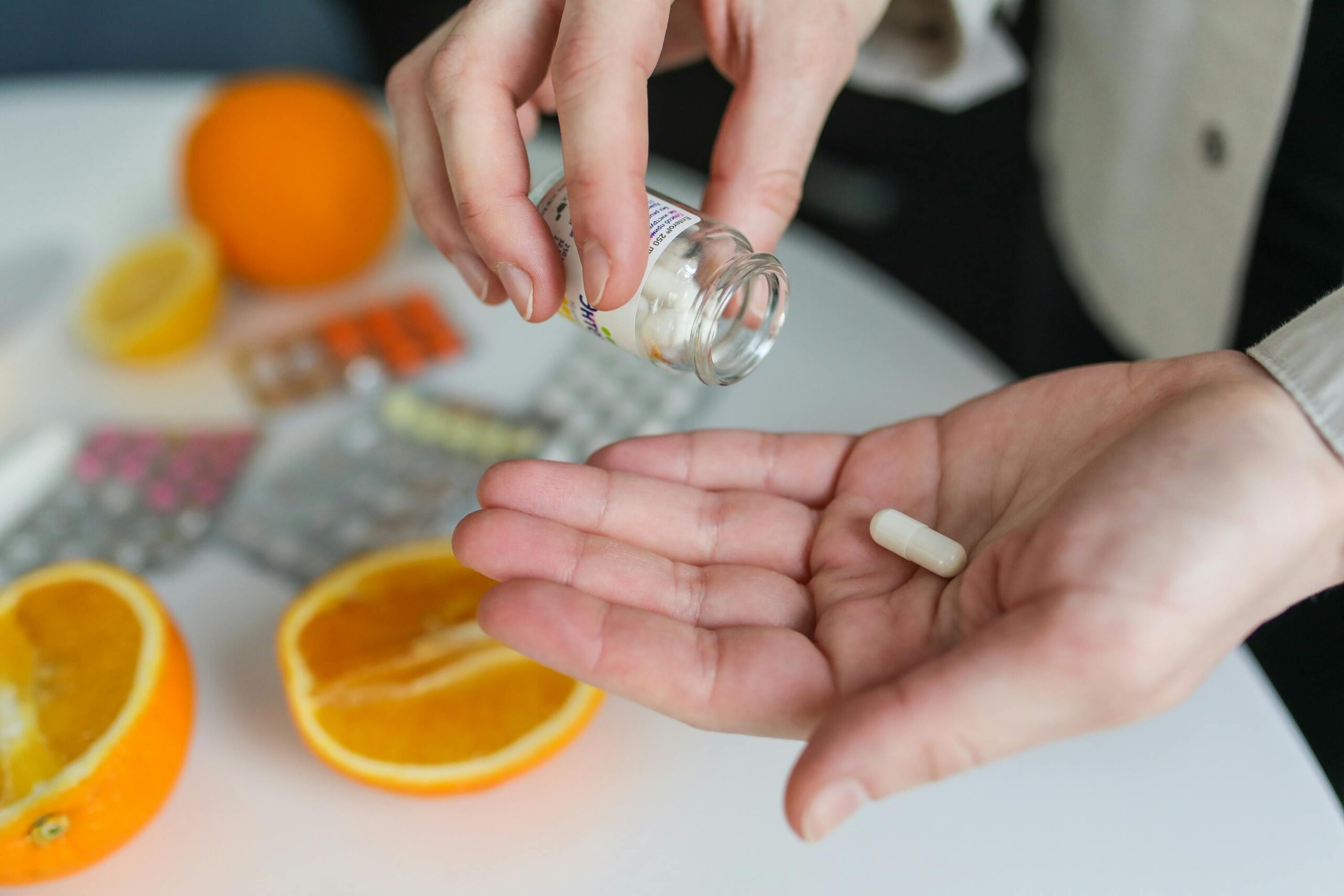 Hand out holding a pill