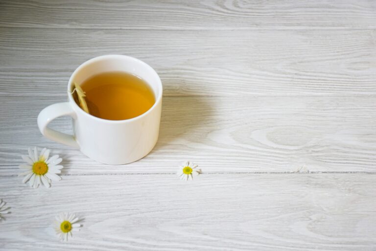 White mug of herbal tea